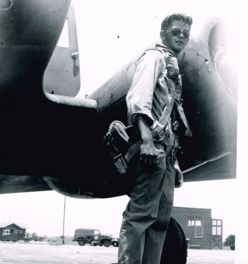 3. An aviation mechanic poses for a shot during WWII.