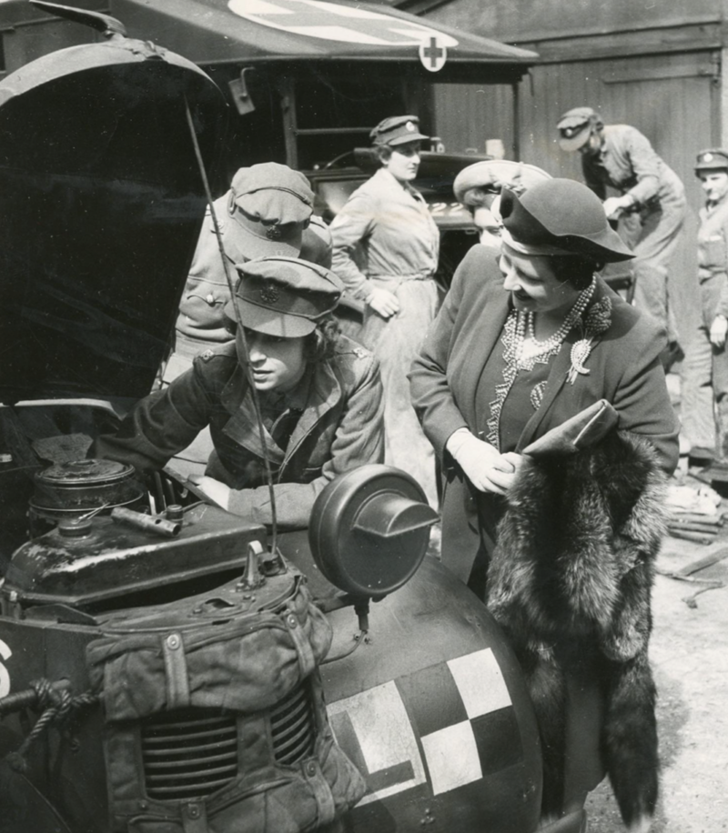 14. Queen Elizabeth working as truck mechanic in WWII, in 1945
